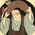Ichikawa Ebizō V as the Buddhist priest Kumagai Renshō Hōshi [熊谷連生法師] standing before an archery bullseye target from the play <i>Ichinotani Futaba Gunki</i>  
