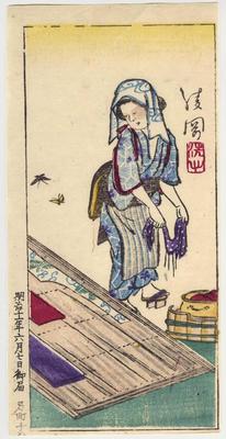 A woman washing and drying fabric 